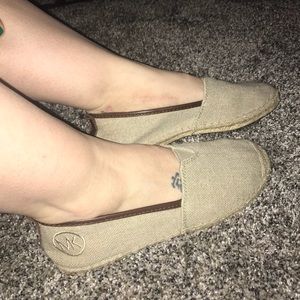 Michael Kors slip ons.